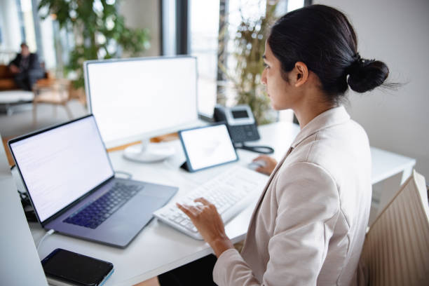 istock Indian Businesswoman Working In The Office And Using Computer 1301532000