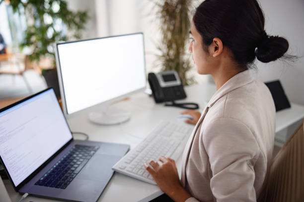istock Young Businesswoman Working In The Office And Using Computer 1301532016
