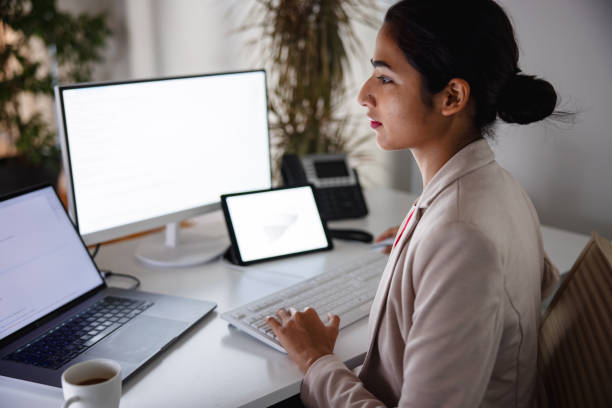 istock Young Businesswoman Working In The Office And Using Computer 1301532055