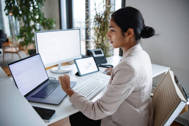 istock Indian Businesswoman Working In The Office And Using Computer 1301532160