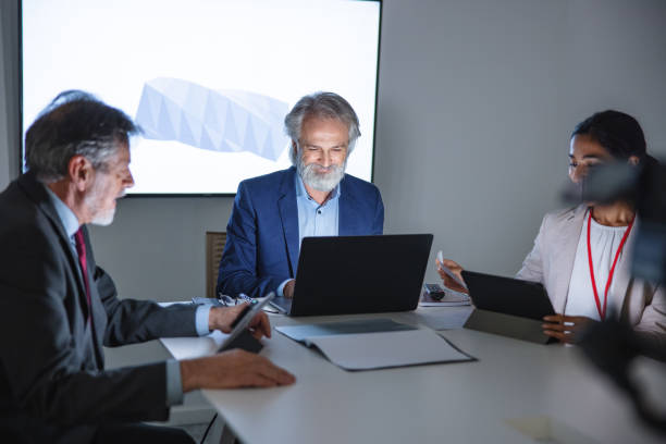 istock Diverse Corporate Business Team Discussing New Ideas With Help Of Technology 1301533362