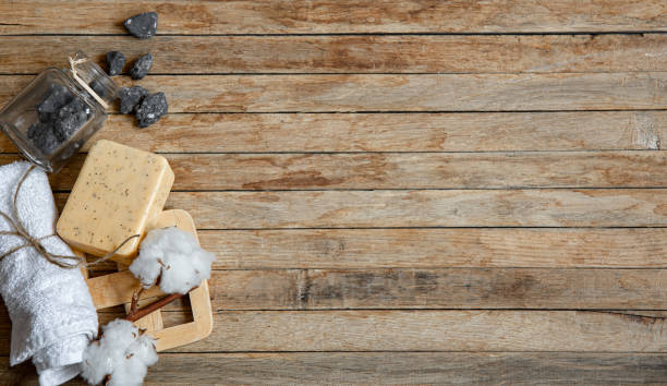 istock Spa composition with natural and organic bath accessories on wooden surface copy space. 1301536995