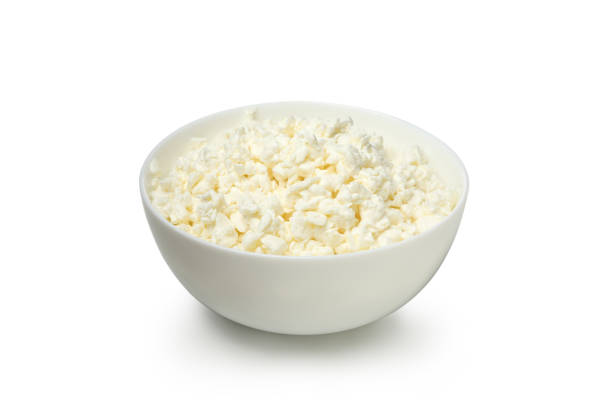 istock Bowl with cottage cheese isolated on white background 1301545104
