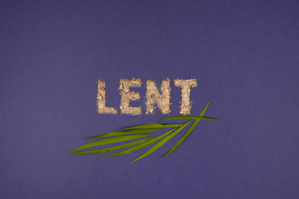 Text, word Lent made of ashes on purple background..  Lent Season, Holy Week, Palm Sunday and Good Friday concept. Text, word Lent made of ashes on purple background.  Lent Season, Holy Week, Palm Sunday and Good Friday concept. Top view. lent stock pictures, royalty-free photos & images