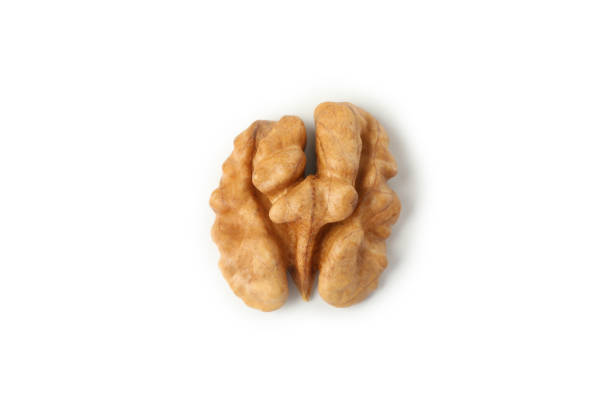 istock Single tasty walnut isolated on white background 1301547000