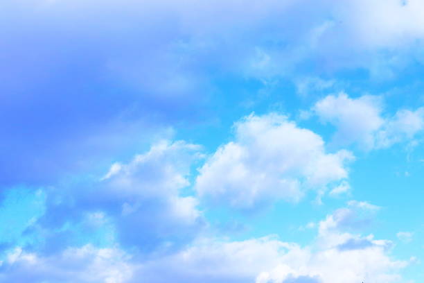 istock blue sky and clouds in white and gray tones. 1301550434