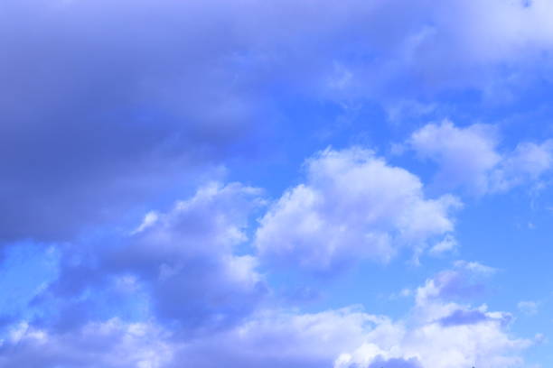 istock blue sky and clouds in white and gray tones. 1301550436