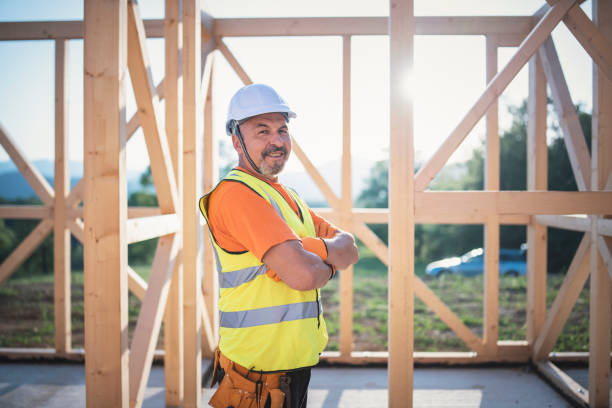 istock Portrait of a smiling senior builder at the construction site. 1301550439