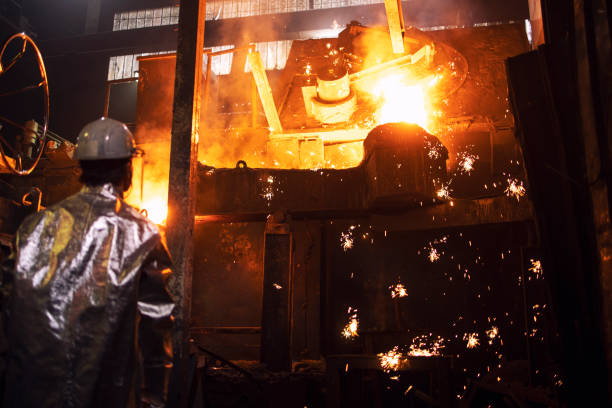istock Metallurgical plant and hot liquid iron casting. 1301550809