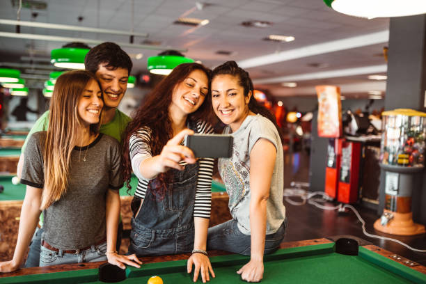 istock friends take a selfie together at billiards 1301554457