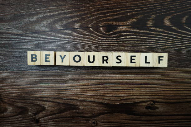 istock Be Yourself Word alphabet letters on wooden background 1301554777