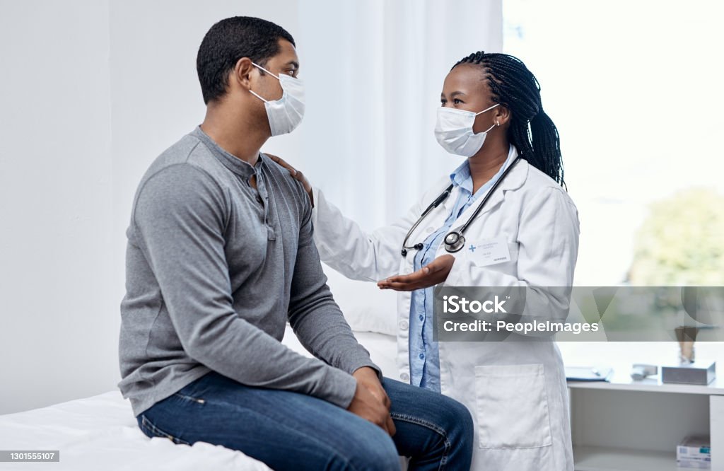 Offering patient-centred care that proves effective and efficient Shot of a doctor having a consultation with a patient Doctor Stock Photo
