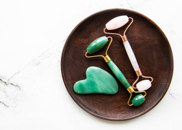 istock Jade face rollers for beauty facial massage therapy 1301555158