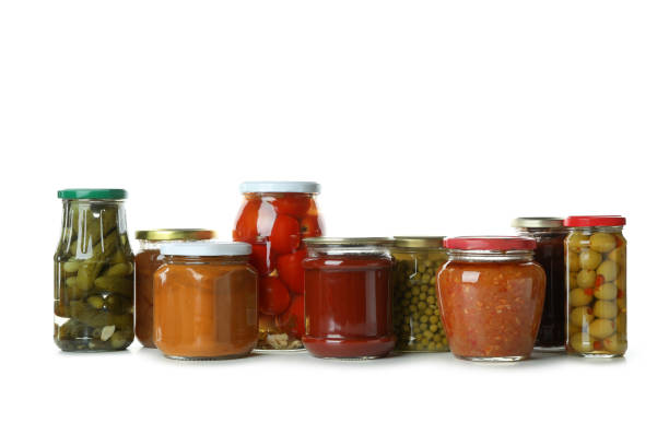 istock Jars with different canned food isolated on white background 1301556700