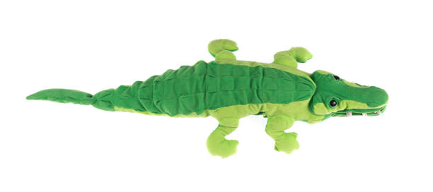 istock plush toy green crocodile isolated on white background 1301559092