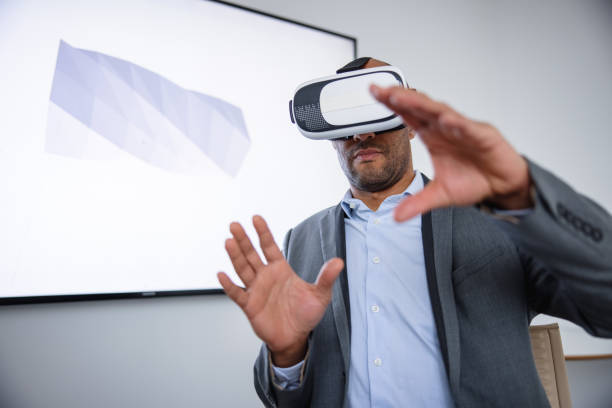 istock Corporate Business Man Interacting With A 3D Model In A Virtual Reality Headset 1301560098