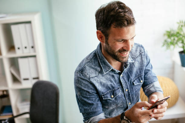 istock Businessman in office using the phone. 1301563660