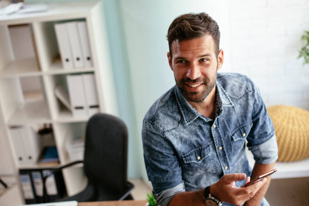 istock Businessman in office using the phone. 1301563791