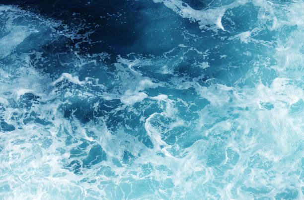 istock Blue frothy surface of sea 1301564254