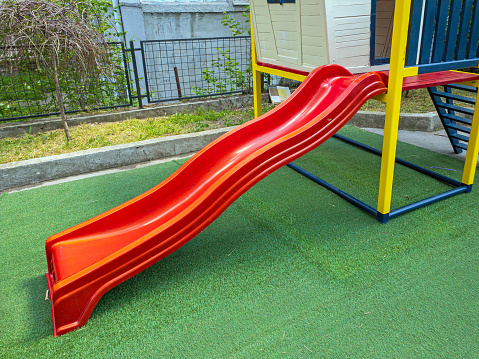 Red Plastic Slide For Kids Fun Playground