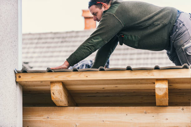 istock Metal roofing - roofer working on the house roof 1301569546