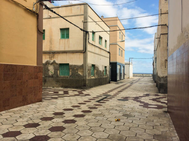 Abandoned buildings on empty street in Tenerife