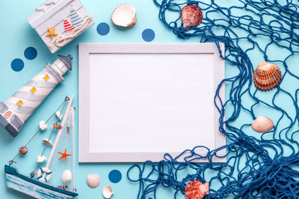 istock Summer travel concept flat lay with mock up frame on blue, top view 1301571248
