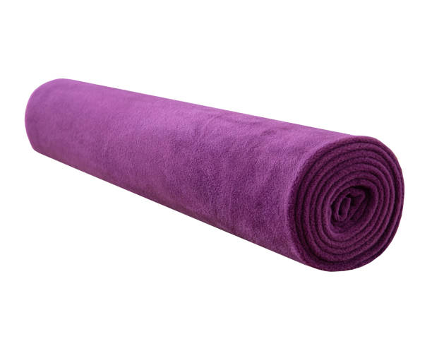 fleece or polar blanket roll. purple yoga blanket. - mor imagens e fotografias de stock