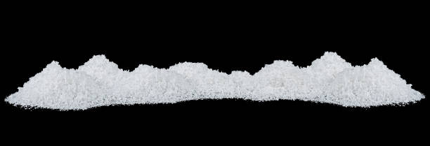 istock Snow hills on a black background, close-up. Snow crystals on the black. 1301572221