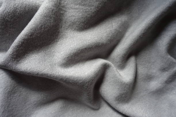istock Gray jersey cotton fabric in soft folds 1301574131