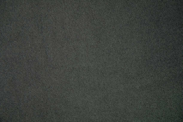 istock Fleece, Polar or Blanket black color fabric texture background. 1301574978