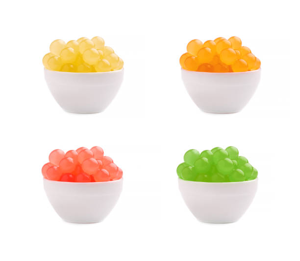 Mix tapioca pearls for bubble tea isolated on white background. Tapioca pearls in bowl. Mix tapioca pearls for bubble tea isolated on white background. Tapioca pearls in bowl bubble tea photos stock pictures, royalty-free photos & images