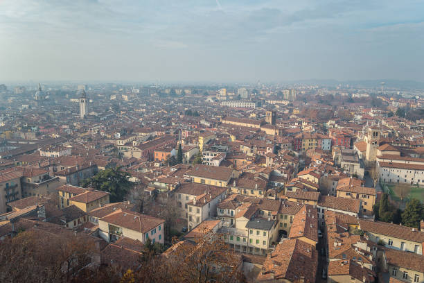 view point from the castle on the city of Brescia on a sunny clear day against a bright blue sky. Brescia castle. Brescia, Lombardy, Italy.