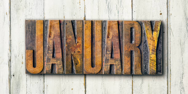 istock Antique letterpress wood type printing blocks on a white backgound - January 1301585173