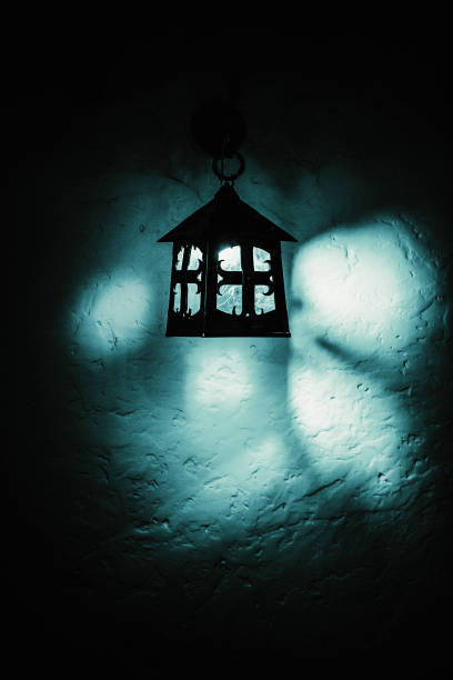 Gothic lantern on the wall in horror style.