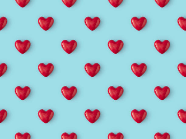 Seamless repetitive Red Heart Shape on blue background