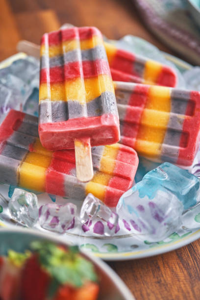 istock Mango, Strawberry, Blueberry Ice Cream on Stick 1301587471