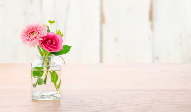 Flowers in a glass vase with copy space