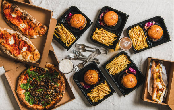 istock Lockdown fast food dinner with burgers, beer, pizza 1301588687