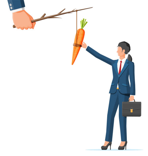 istock Carrot on a stick and businesswoman 1301588784