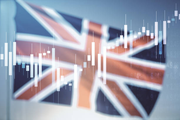 istock Multi exposure of virtual creative financial chart hologram on British flag and blue sky background, research and analytics concept 1301590702