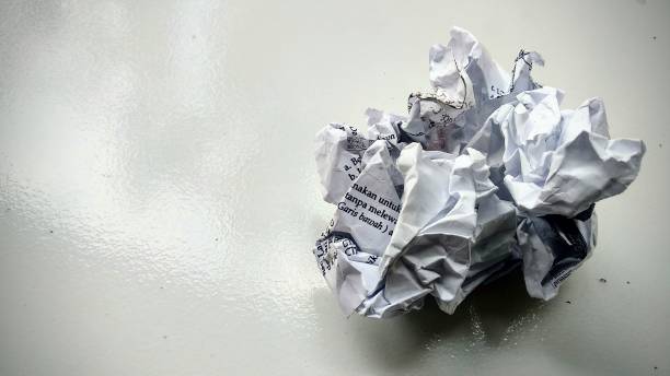 istock Crumbled Paper wasted that is torn away and discarded 1301594200