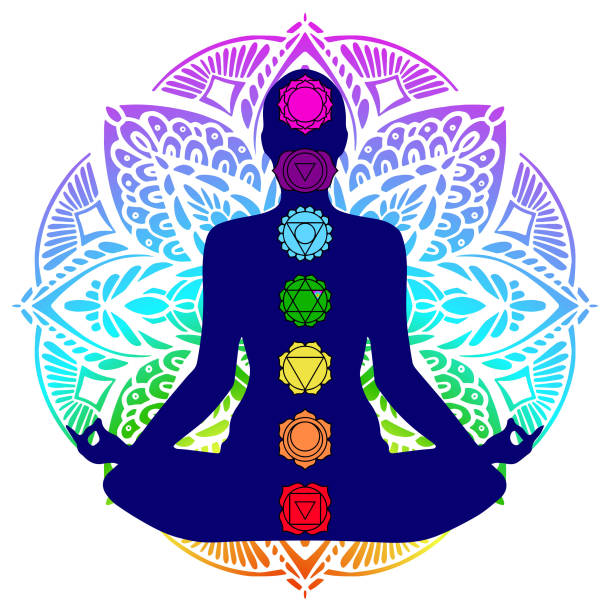 Human silhouette in yoga pose with chakras Human silhouette in yoga pose with chakras soccer striker stock illustrations