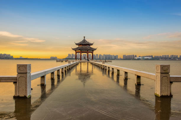 Sightseeing trestle on Jinji Lake in Suzhou, China Under the sunset Sightseeing trestle on Jinji Lake in Suzhou, China Under the sunset On July 7, 2016 suzhou stock pictures, royalty-free photos & images