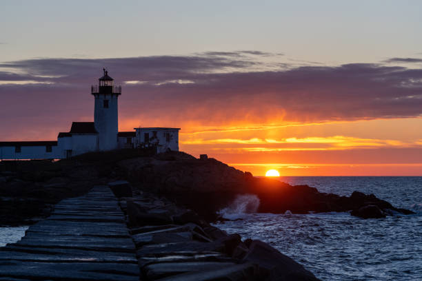 istock Sunrise at a lighthouse on the North Atlantic coast 1301595854