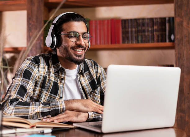 istock Student Having Online Lecture Via Video Call At Laptop Indoors 1301598518