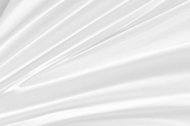 istock Clean textile woven beautiful soft fabric abstract smooth curve shape decorative fashion white background 1301602868