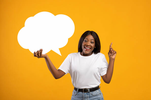 istock Positive african lady with communication bubble pointing finger up 1301604204