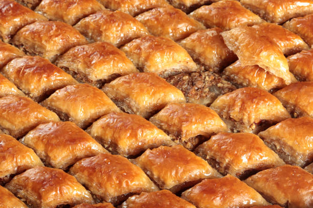 istock Traditional Turkish dessert Baklava. With walnuts and pistachios. 1301610817