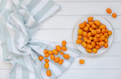 Kumquats on wood